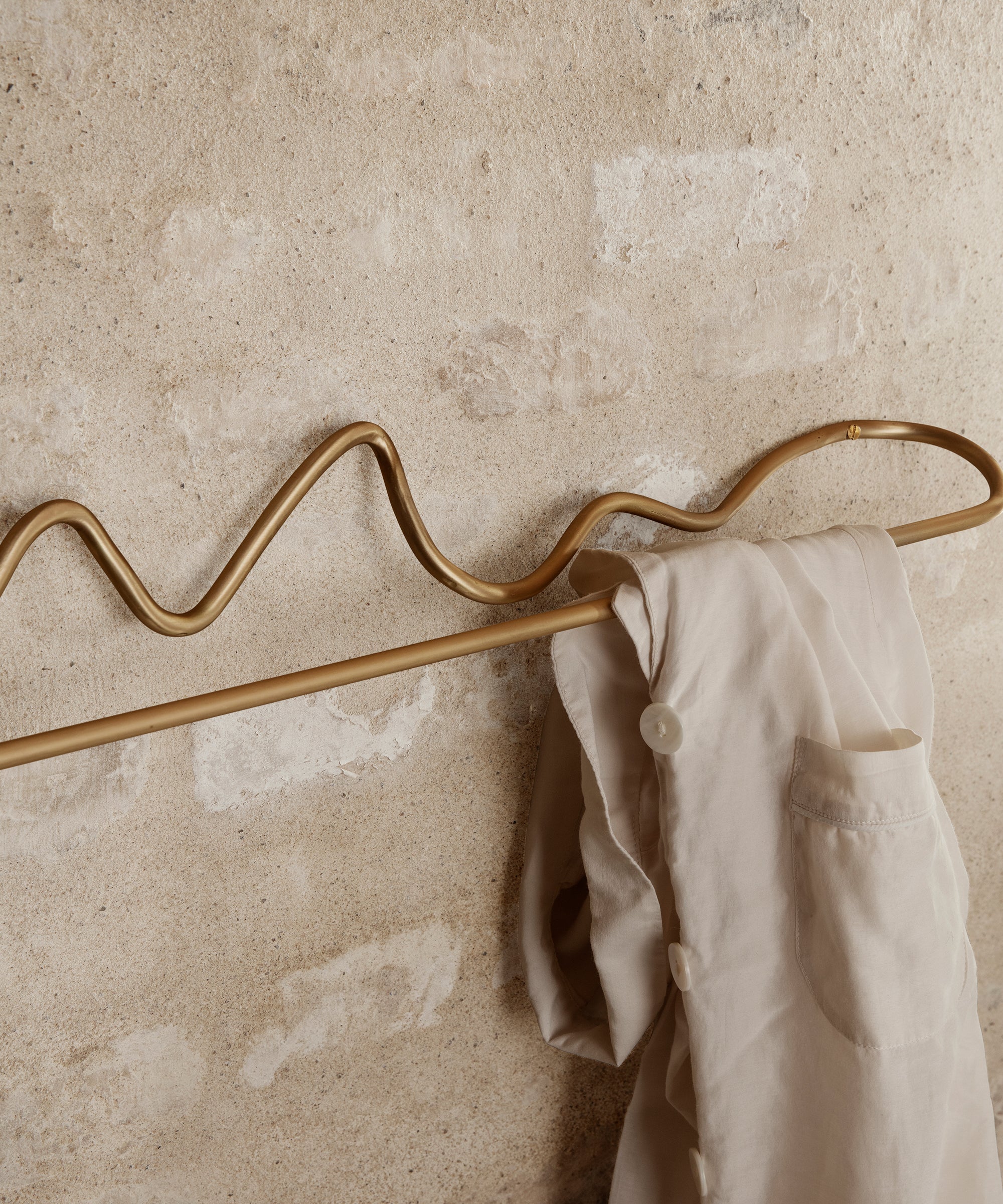 Curvature Towel Hanger
